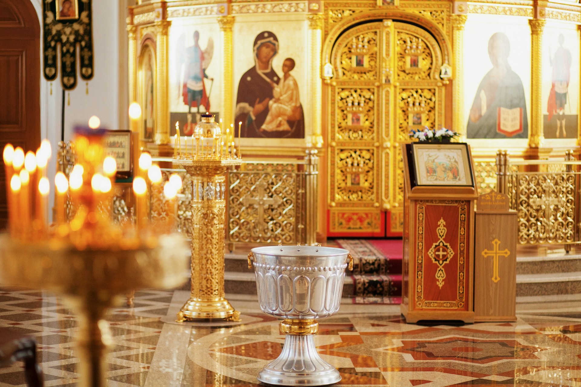 The sanctuary with candles lit for Mass